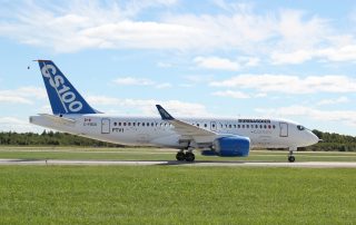 CSeries FTV1 stops on the taxiway in front of the crowds after its first flight.