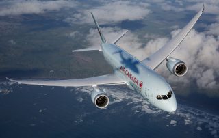 The shadow of Wolfe Air's Learjet 25 camera plane on Air Canada's Boeing 787-8 during a photo shoot over the Pacific Northwest. Photo: Air Canada