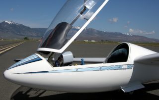 The LS4 waits for us in the staging area near the threshold of Runway 30. I only left the canopy up long enough to quickly take this photo on a no-wind day - a strong breeze could smack it down and damage it.